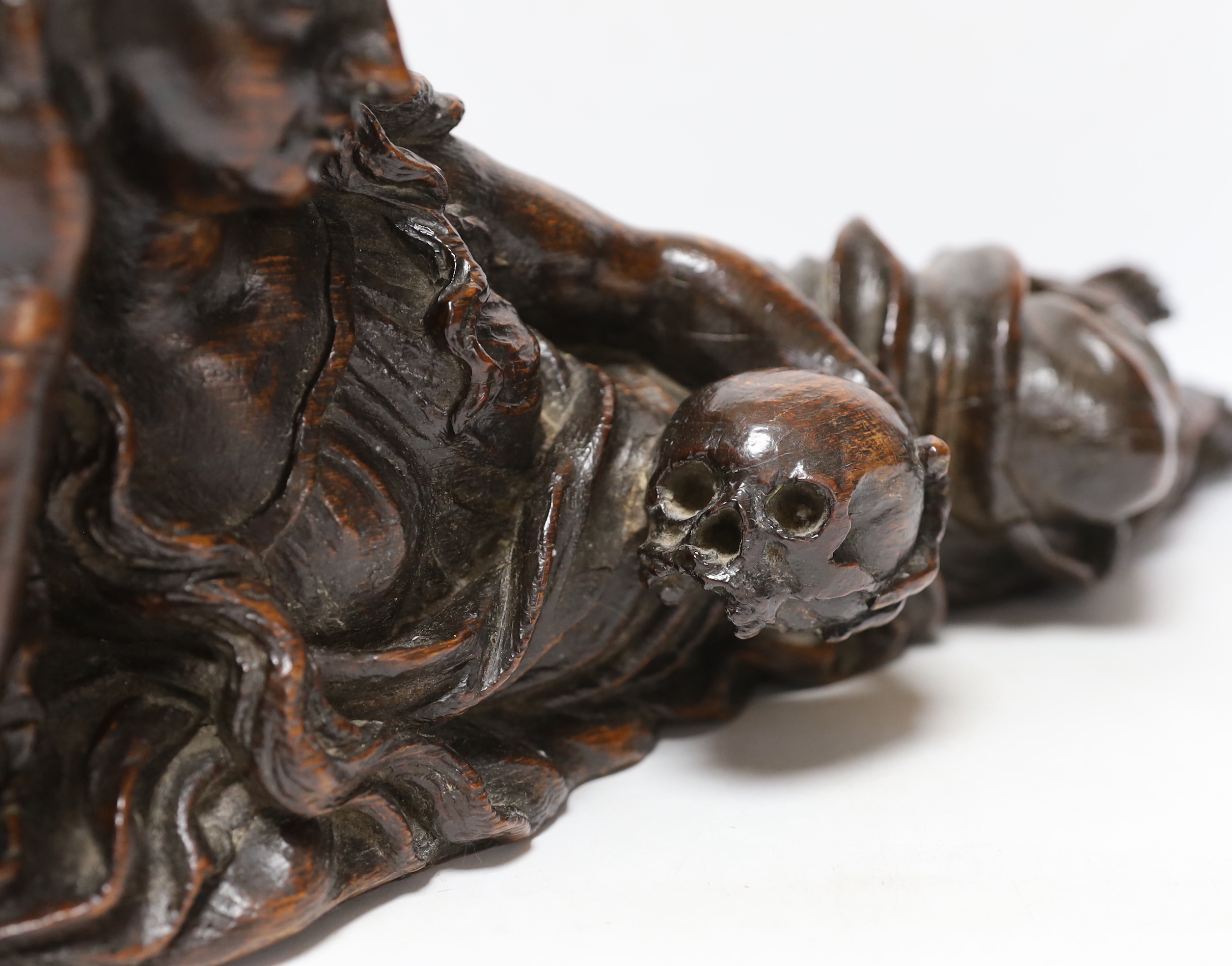 A 17th century carved oak figure of the penitent Mary Magdalene, possibly English, 52.5cm
